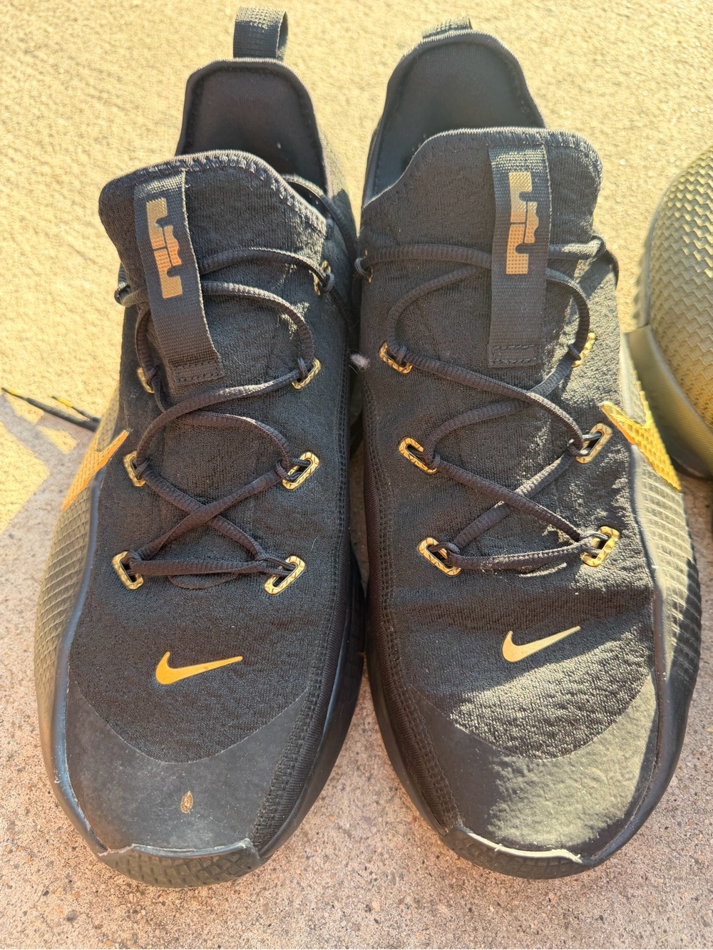 Nike Men’s Black with Gold Swoosh Athletic Shoes
